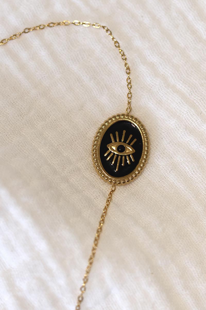 CORALIE | Pulsera de eslabones finos dorados con ojo negro