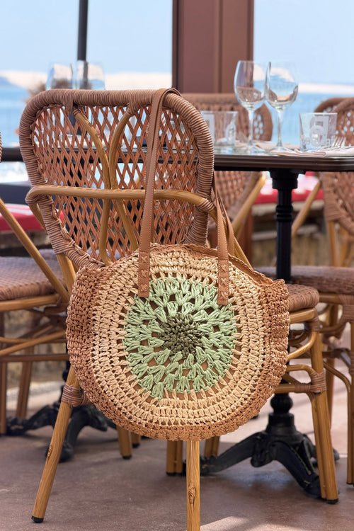 APOLLINE | Bolso redondo estilo rafia en color natural y verde claro